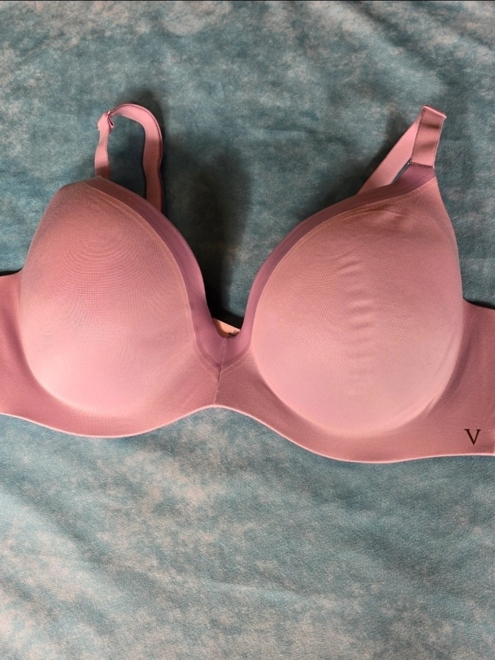 Victoria’s Secret Perfect Shape wireless bra in a soft lilac/purple shade.
